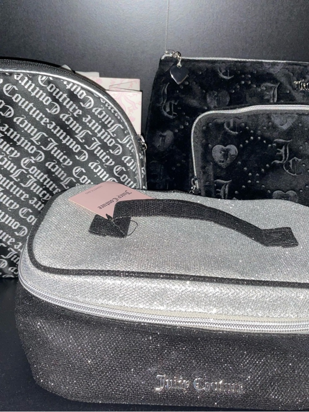 Juicy Couture cosmetic bags and travel cases set